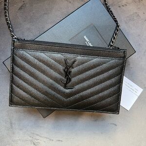 Yves Saint Laurent black monogram clutch / crossbody